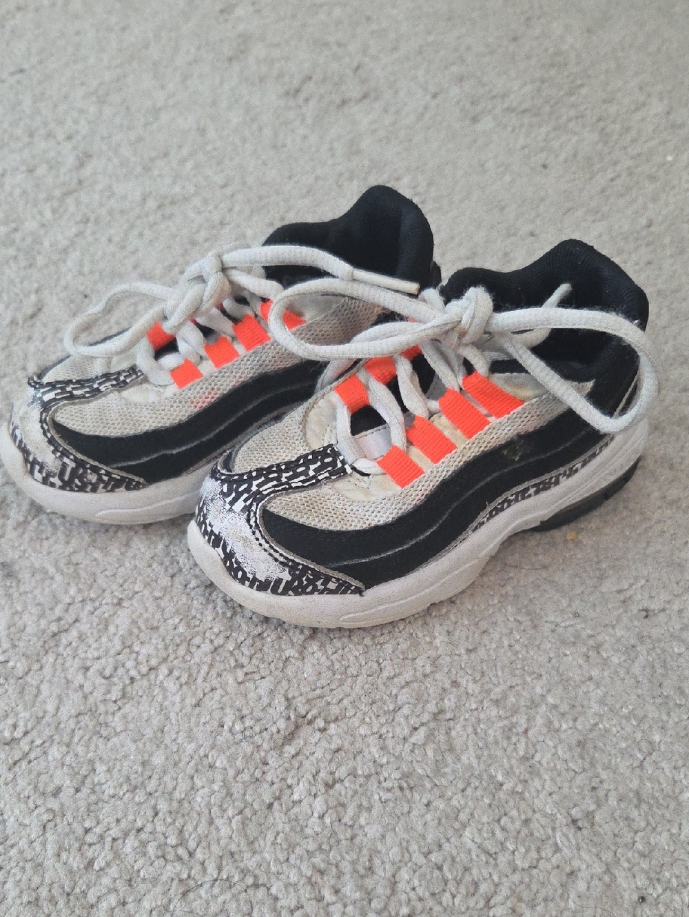 Nike Kids Athletic Sneakers in Black, White & Neon Orange